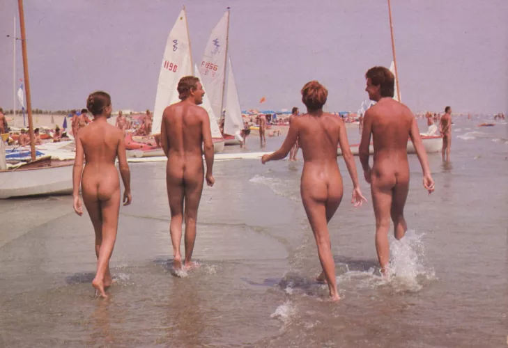 Simple things in life, like walking on the shore with friends. by NaturistPictures