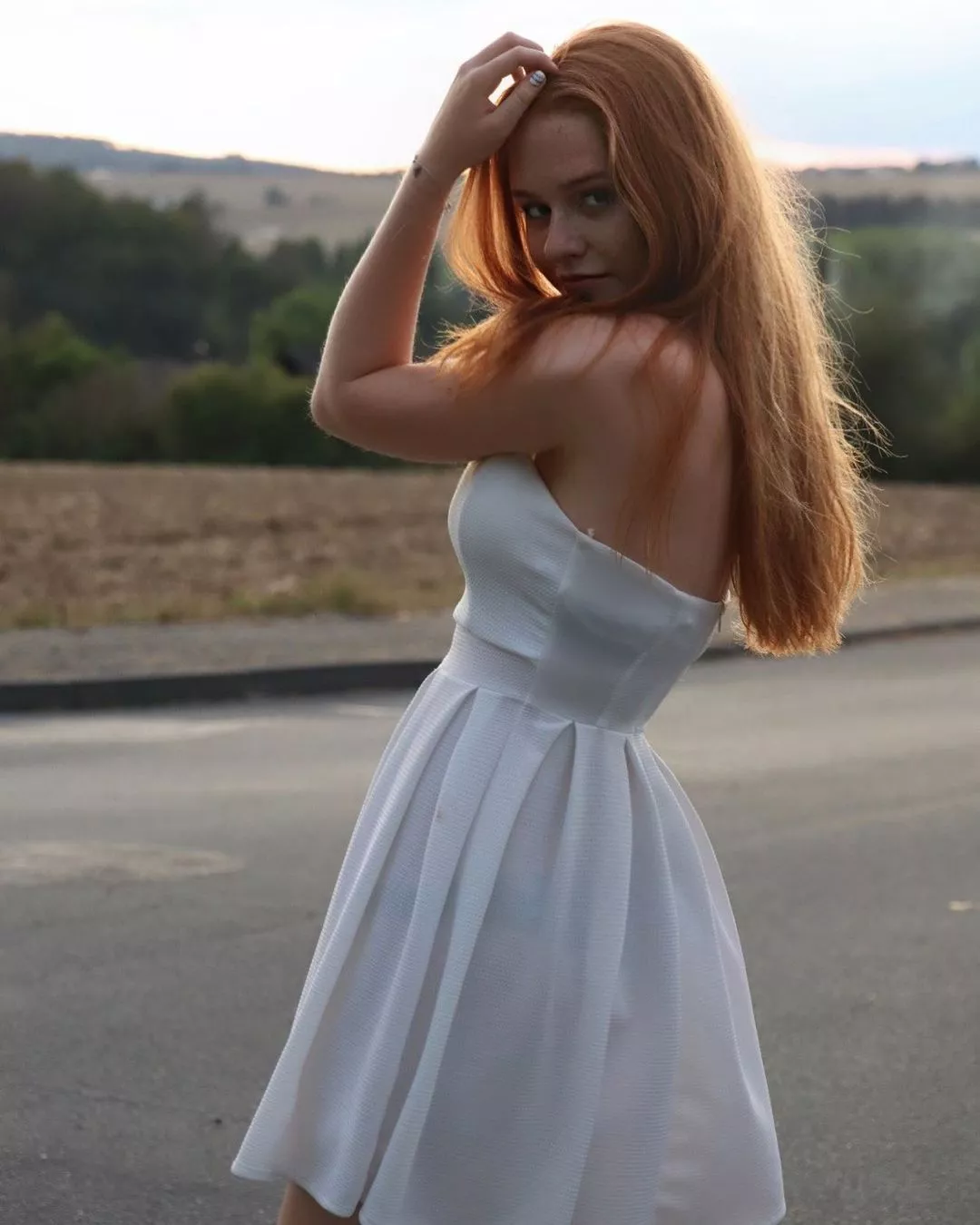 Slender beauty in sheer dress. posted by spandexluvr77