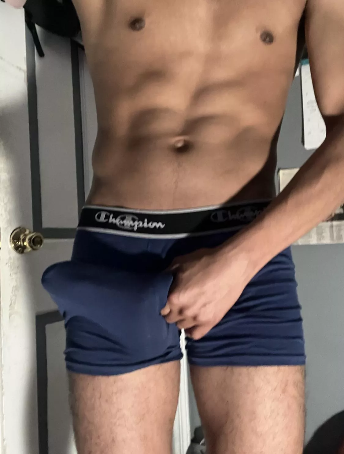 Squeezing my massive bulge. posted by Hunggothboy