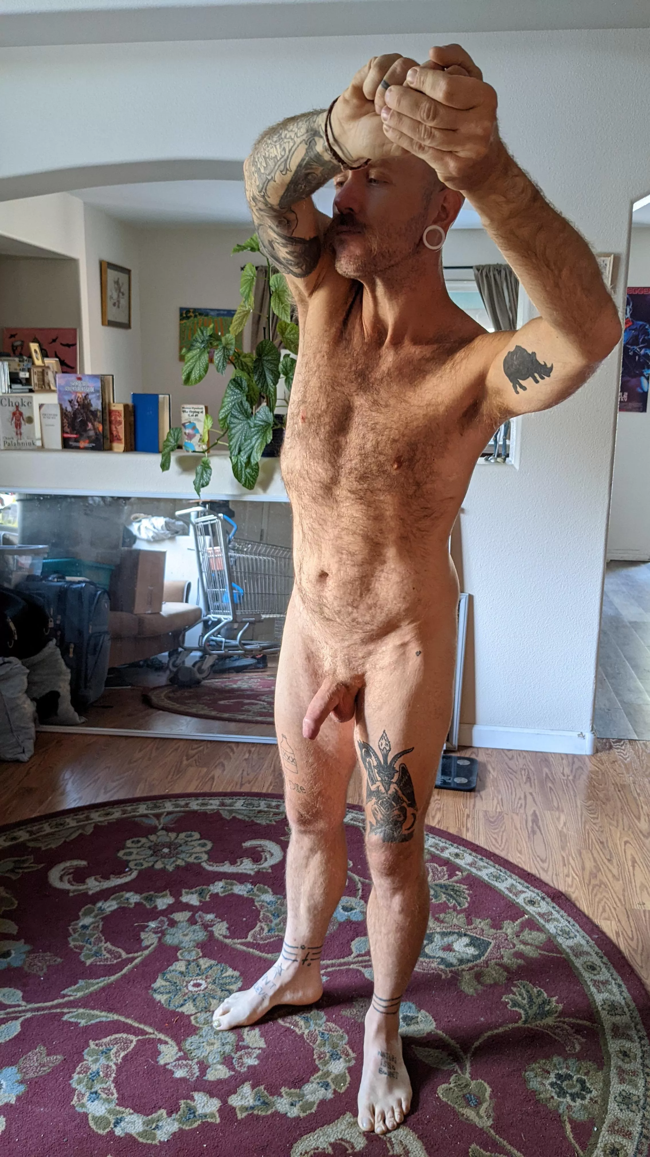 Stretching in the living room posted by theprimeprof