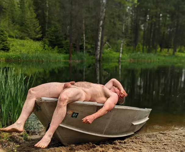 Sunning myself on a boat at the lake; if it's yours, I hope you don't mind by No-Sun-2263