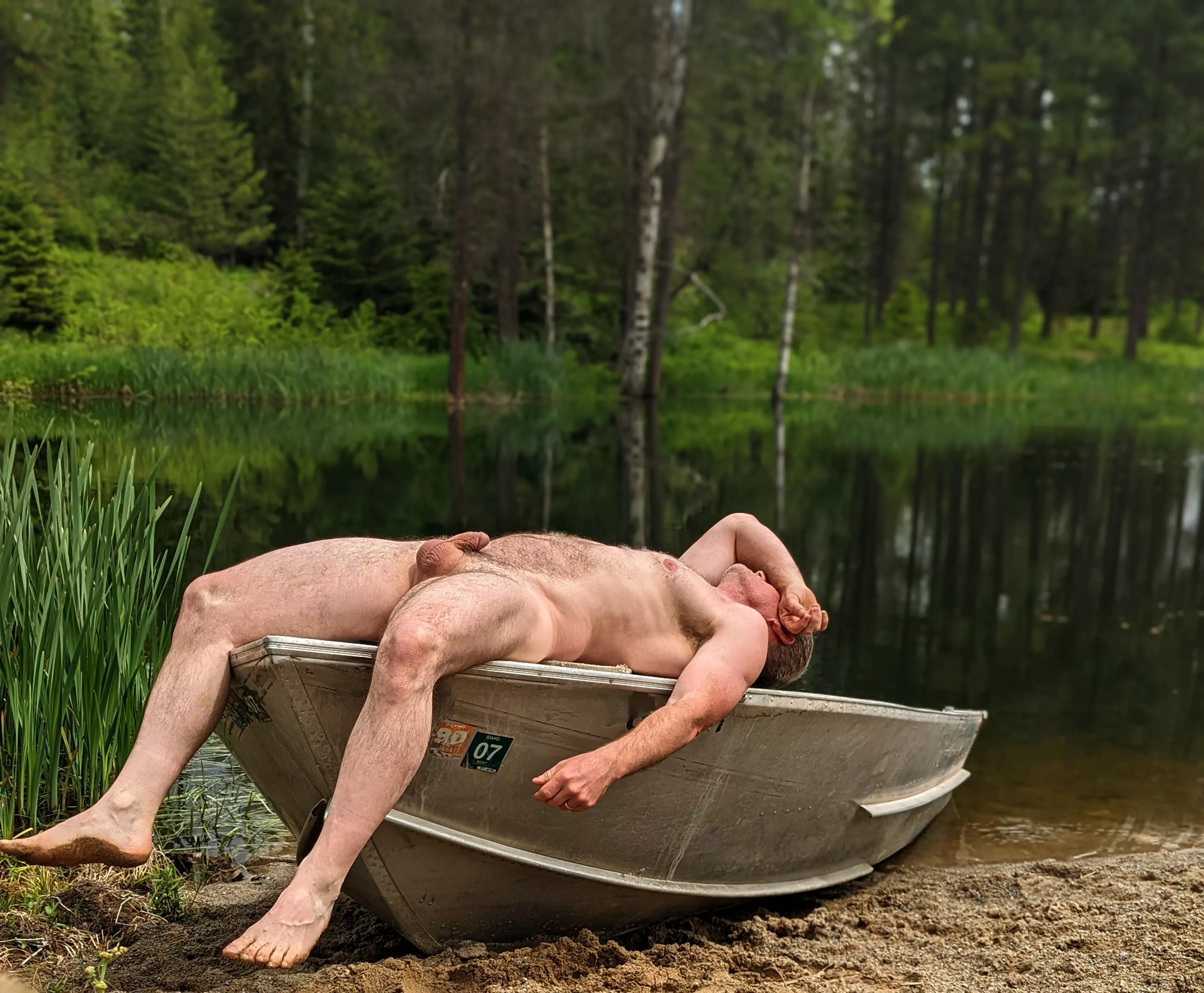 Sunning myself on a boat at the lake; if it's yours, I hope you don't mind posted by No-Sun-2263