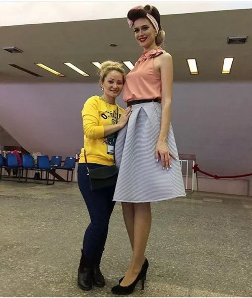 Tall lady with short friend by moustacheoftruth
