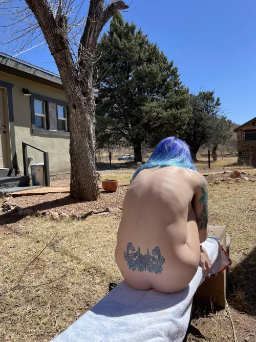 Tanning in the back yard, people could’ve caught a peek if they timed it right by lilglitterbitch