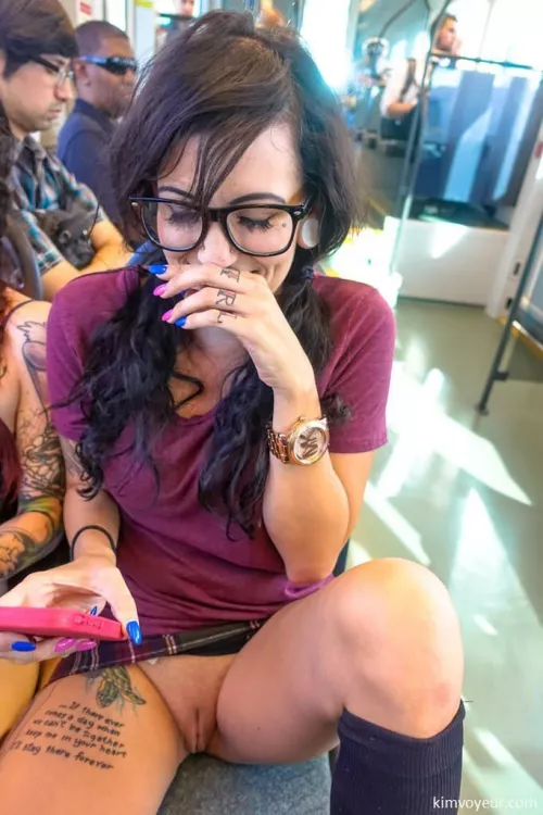 Tattooed chick in the bus by kitttyxyx999