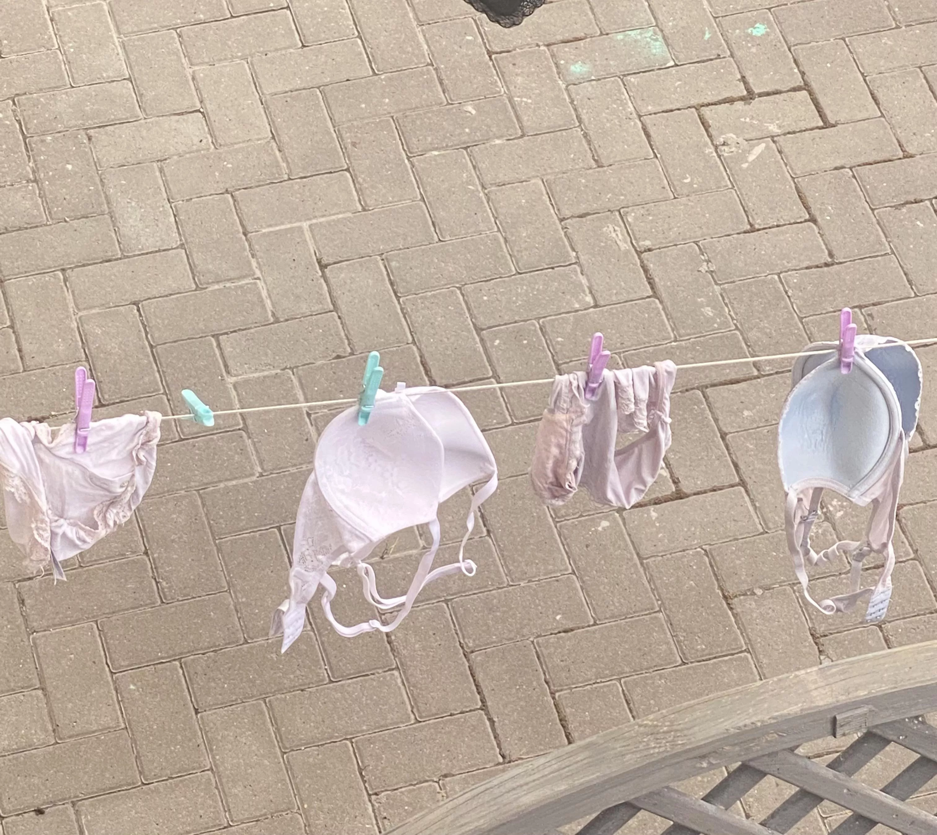 Teasing neighbour loves to show her bra and panties on the washing line posted by therock25785