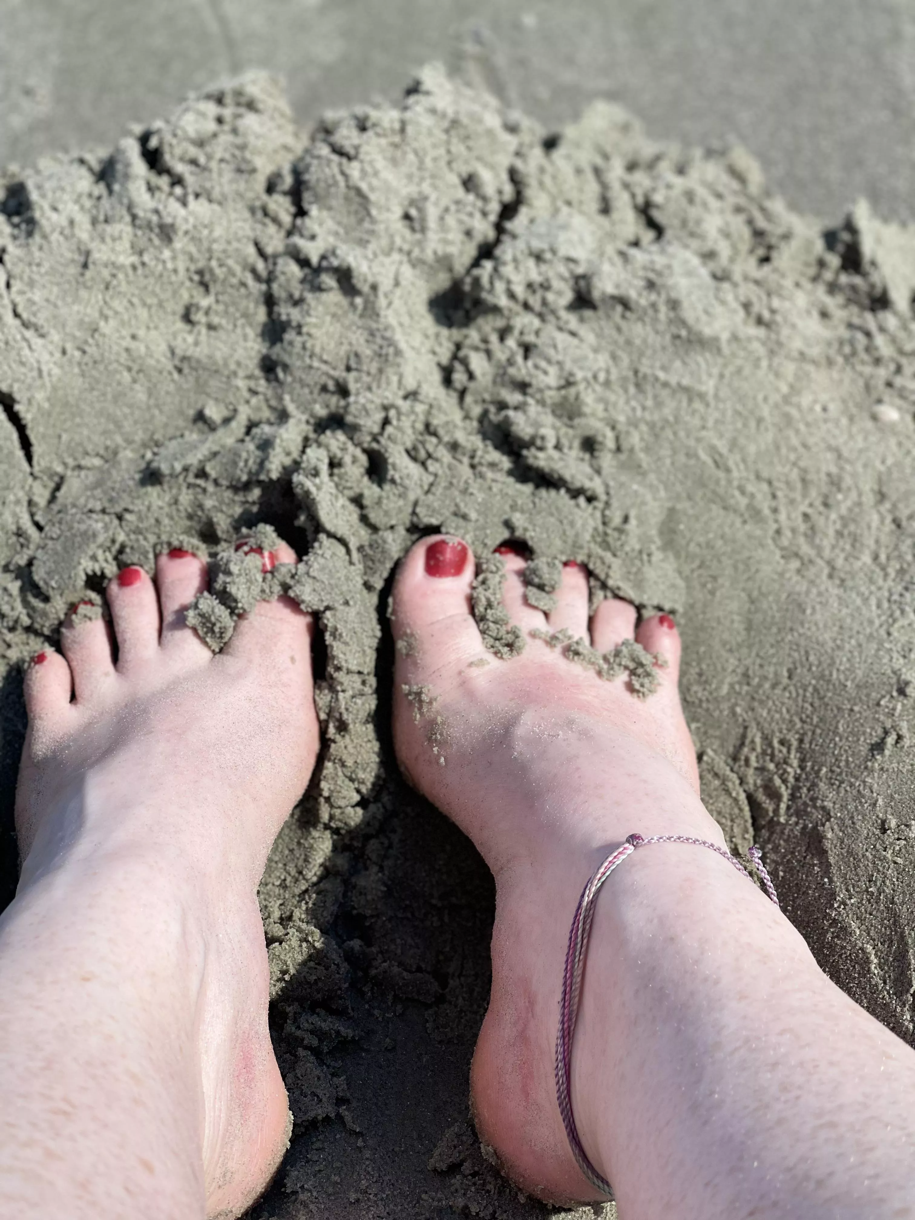 The sand feels so good in between my toes posted by hornywifeamber