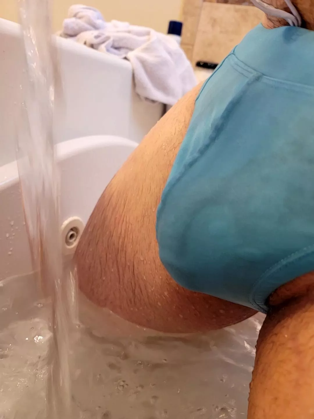The wet blue speedo again. posted by CoupleFilthyAnimals