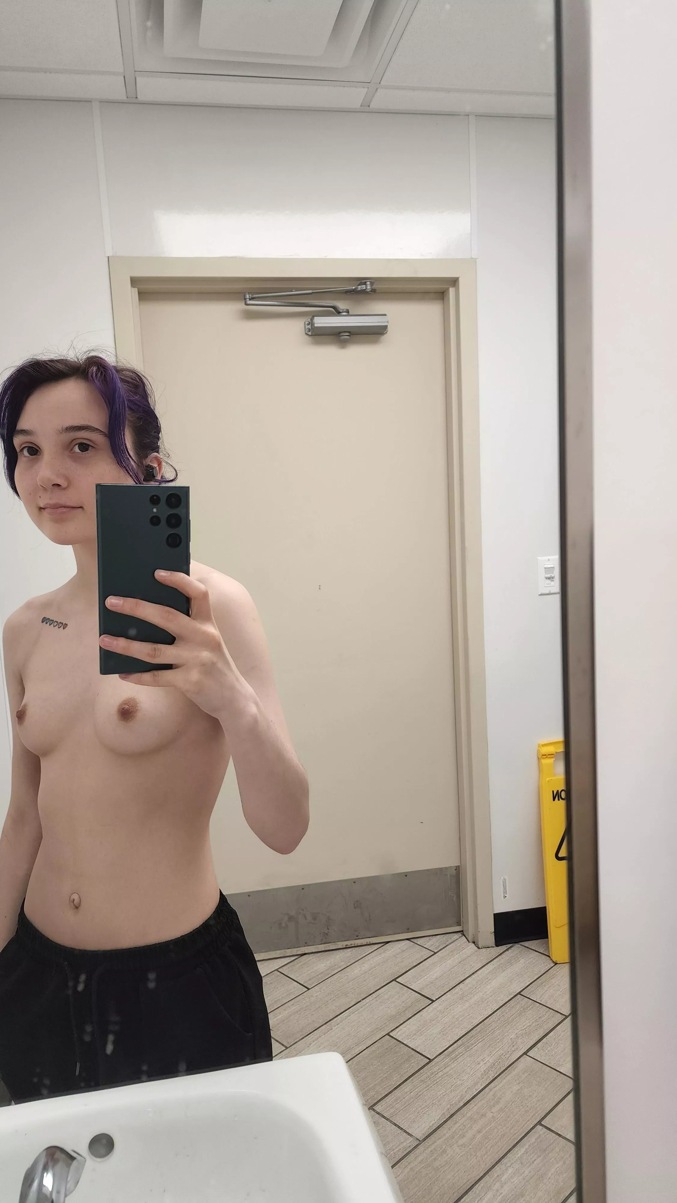 Topless at work posted by iambatmansbff