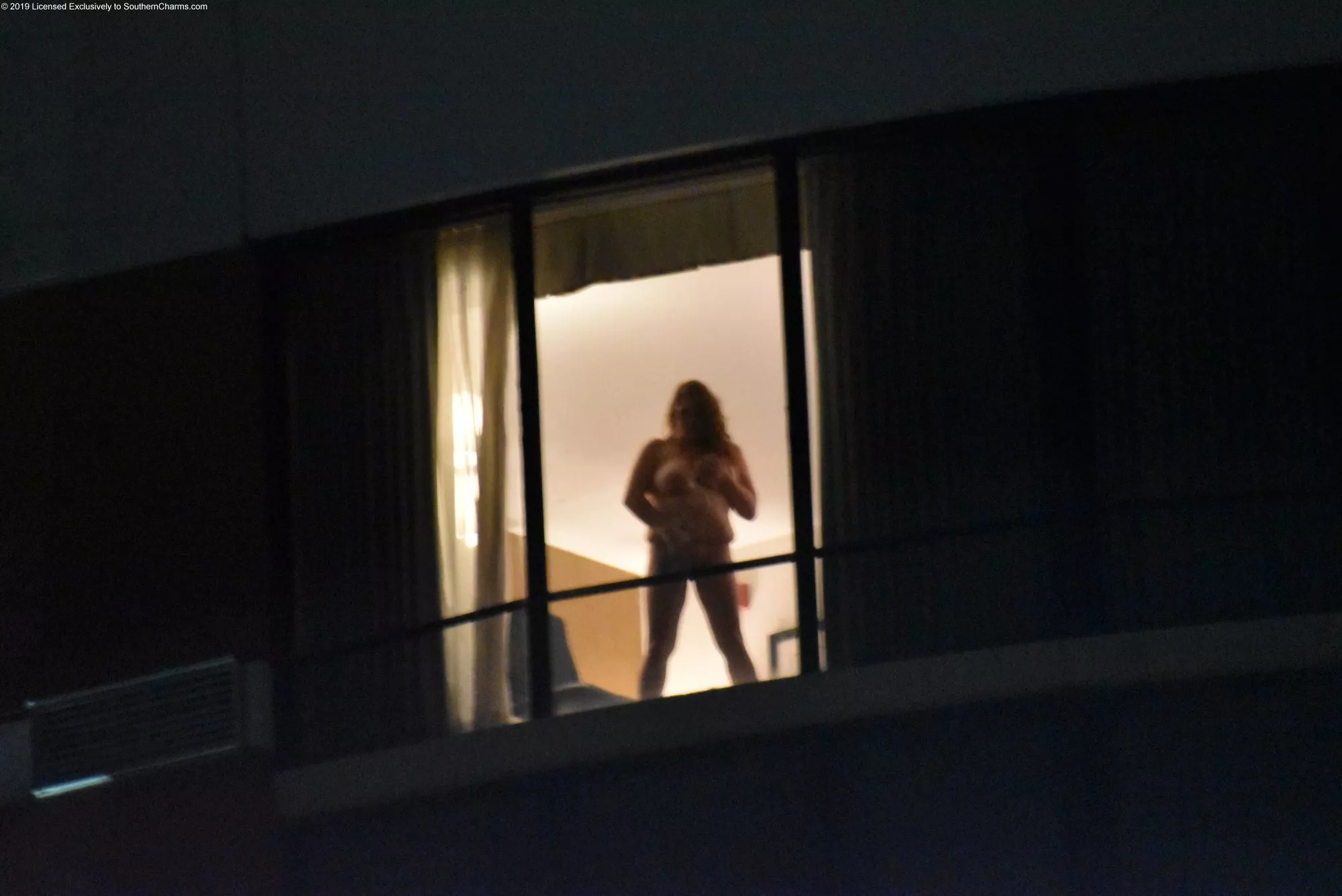 Trying to get some attention from my hotel window..... posted by RoxyDover