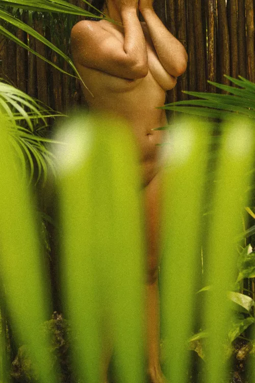 Using the shared outdoor shower at our hotel by thedeitynextdoor