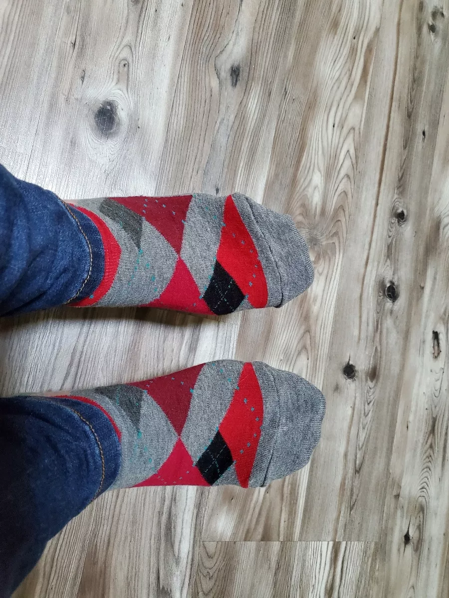 Wearing my striped socks around the house :) posted by only_feetpc2022