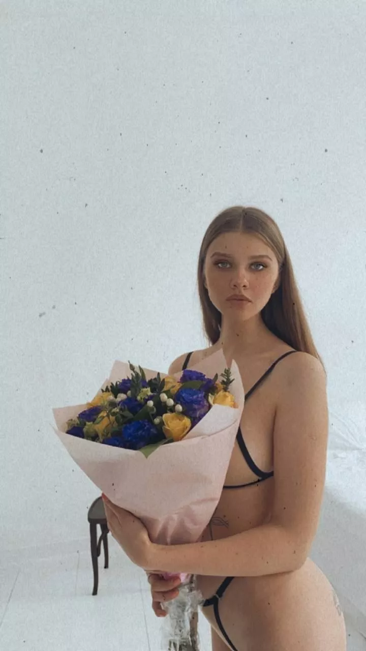 with a bouquet of flowers 💖 posted by sweetstrawberry12