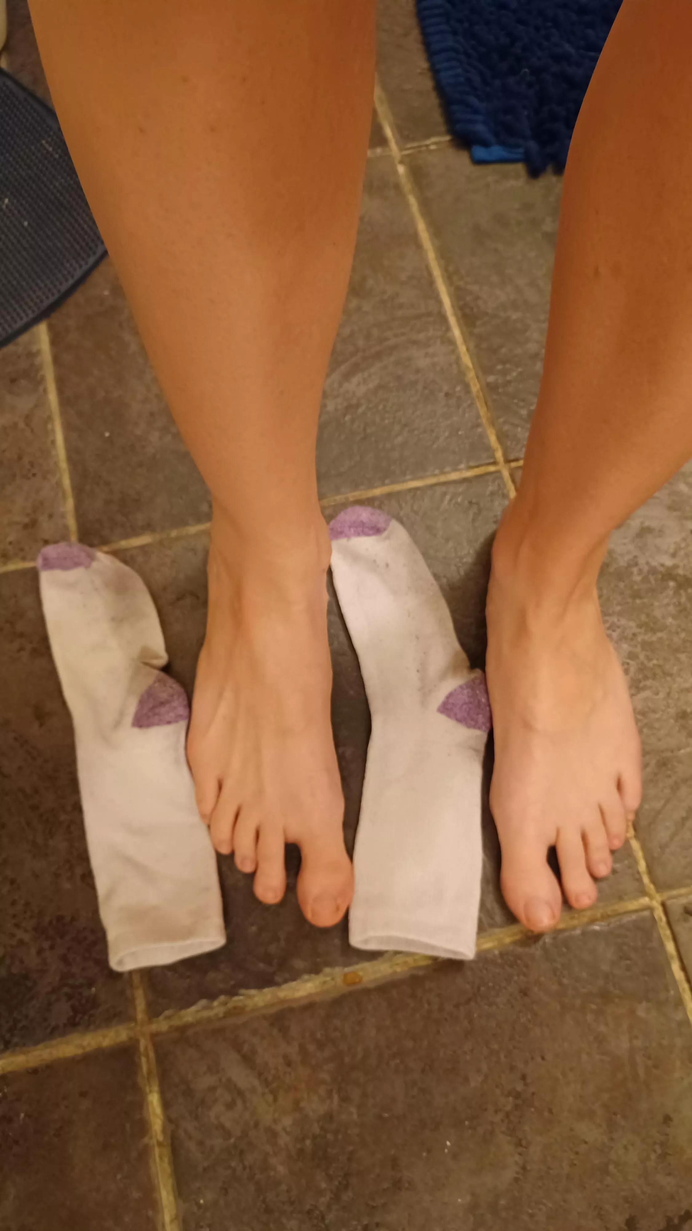 Time to stretch out and stink up these socks. My size 13 feet dwarf these women's socks, huh? posted by Longfoot-Lola