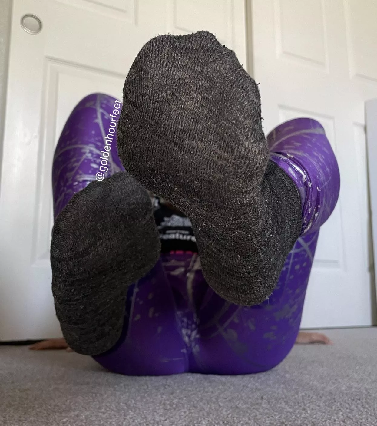 Putting my smelly socks in your face 😈 posted by goldenhourfeet