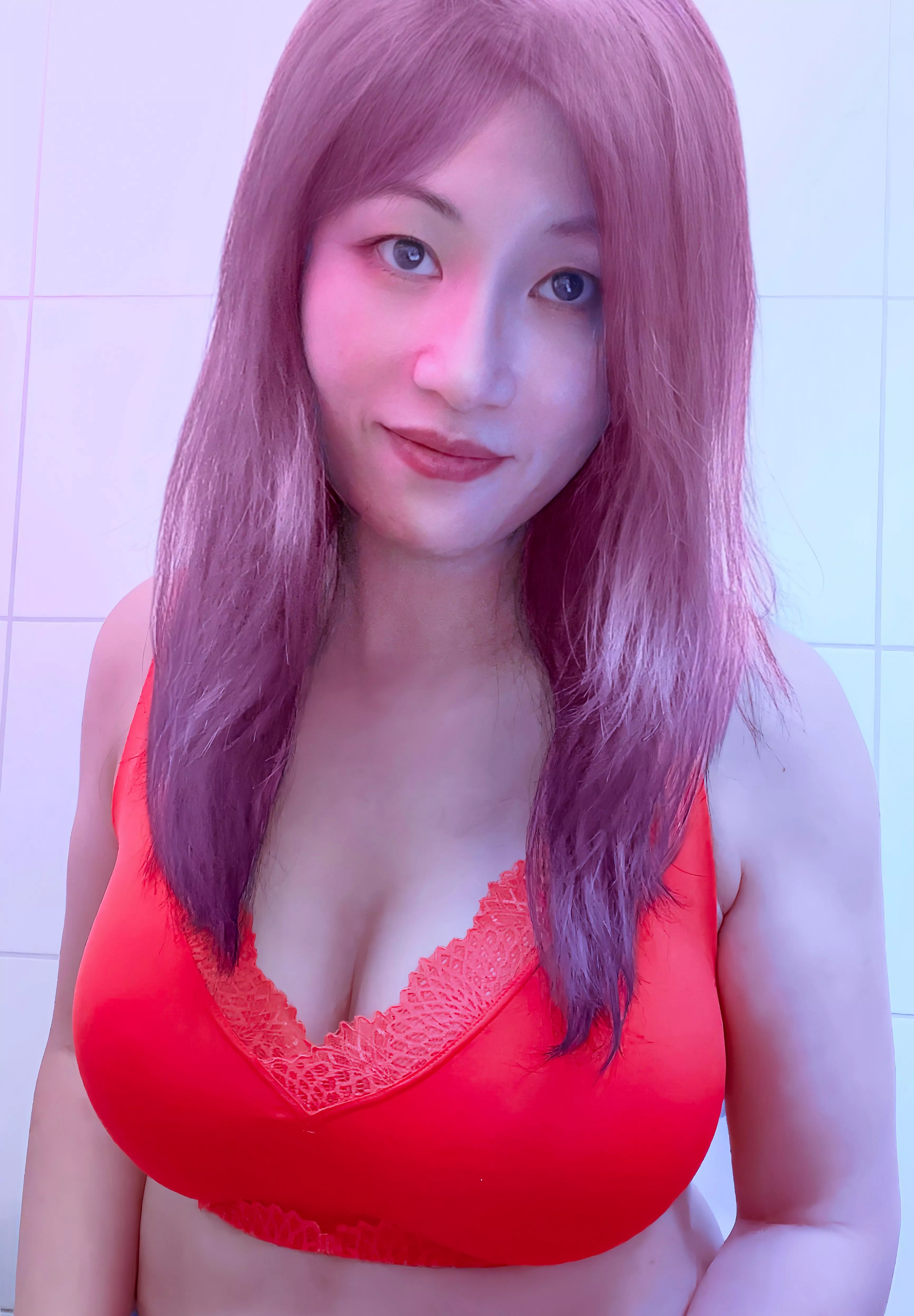 Trying my new bra. I like the orange color. posted by aprilzwonder