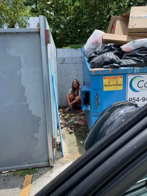 Watering the trash by dalicious_