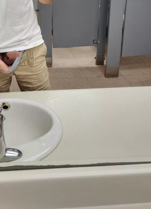 whipped my cock out in a retail store bathroom ;) by gayselfsucker