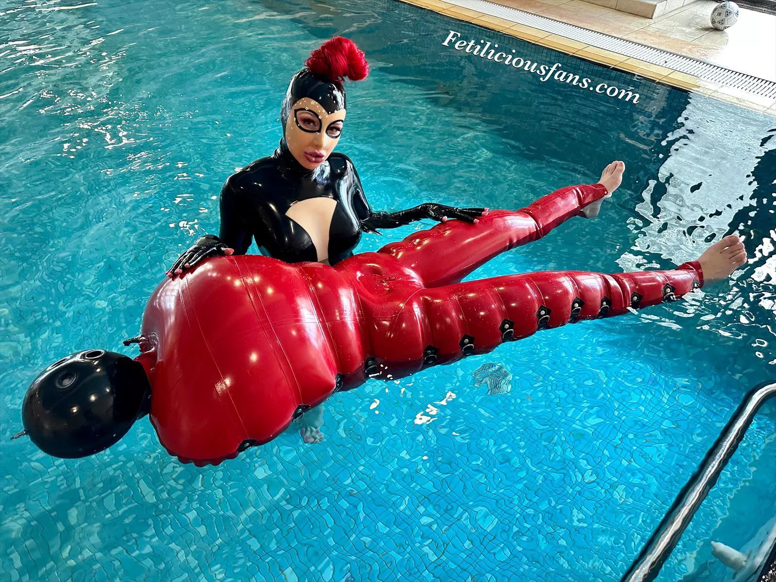 Floating around in the pool at EFM ❤️ (Inflatable catsuit by DeMasK Amsterdam) posted by Miss_Fetilicious