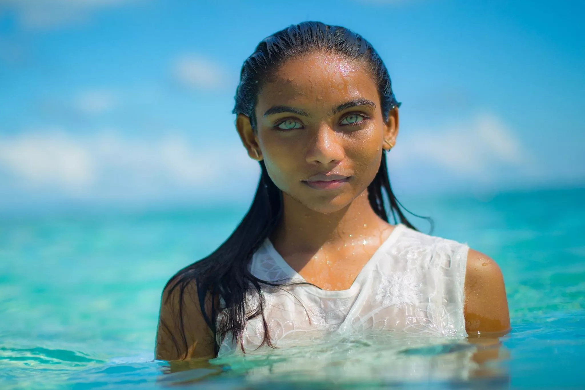 Maldivian girl with Aqua-blue eyes posted by proneSermon