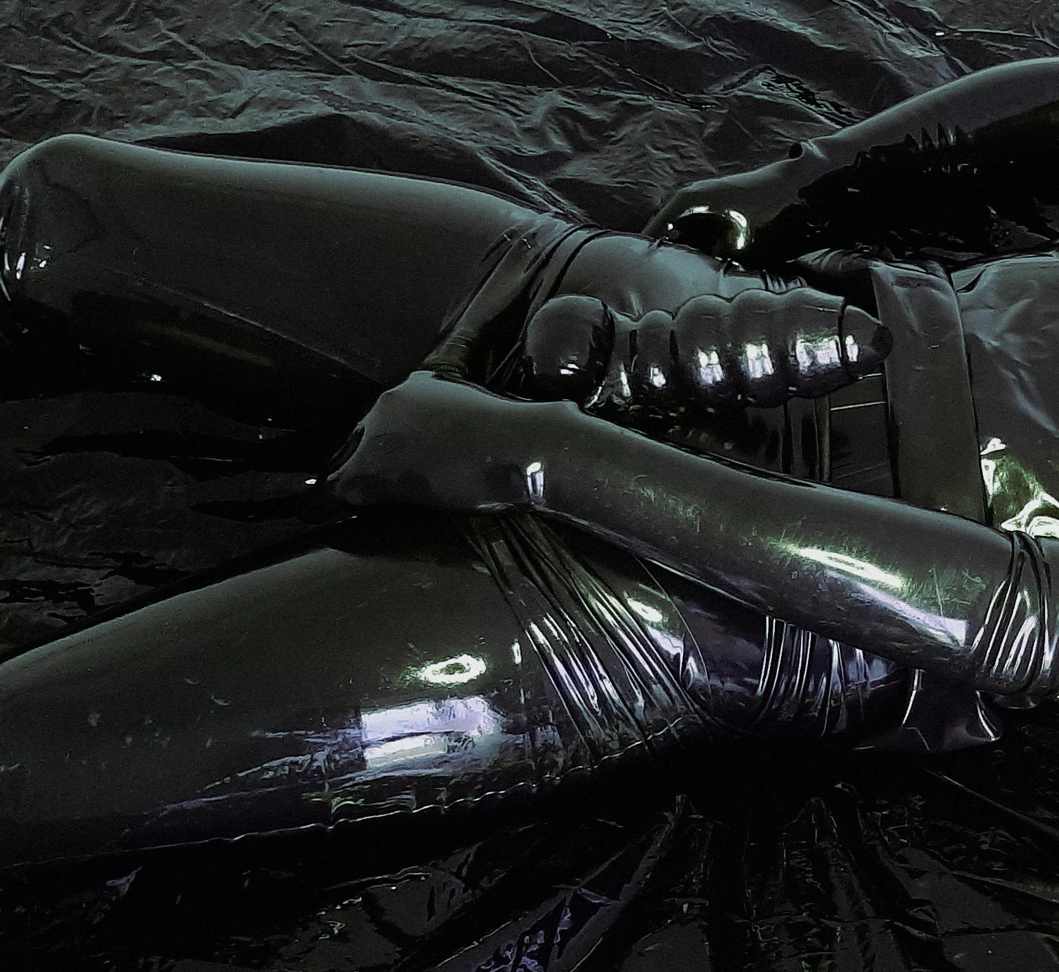 Completely encased in several layers posted by AnonRubberGuy