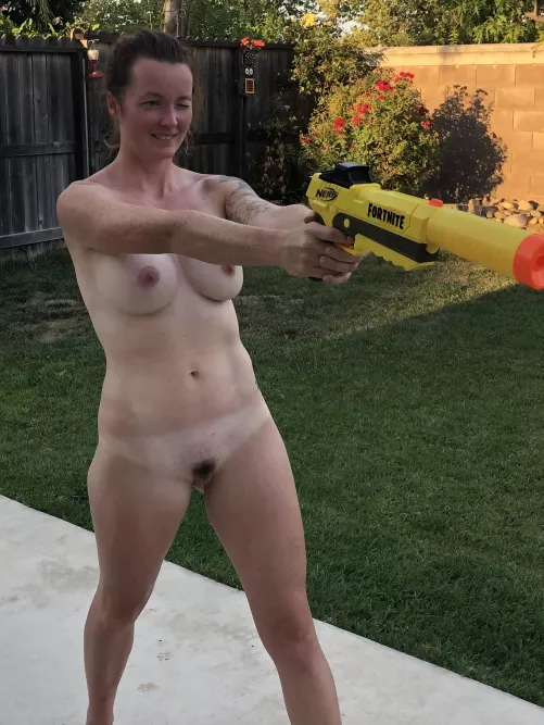 Hot summer days mean naked Nerf fights in the back yard. by fitredd