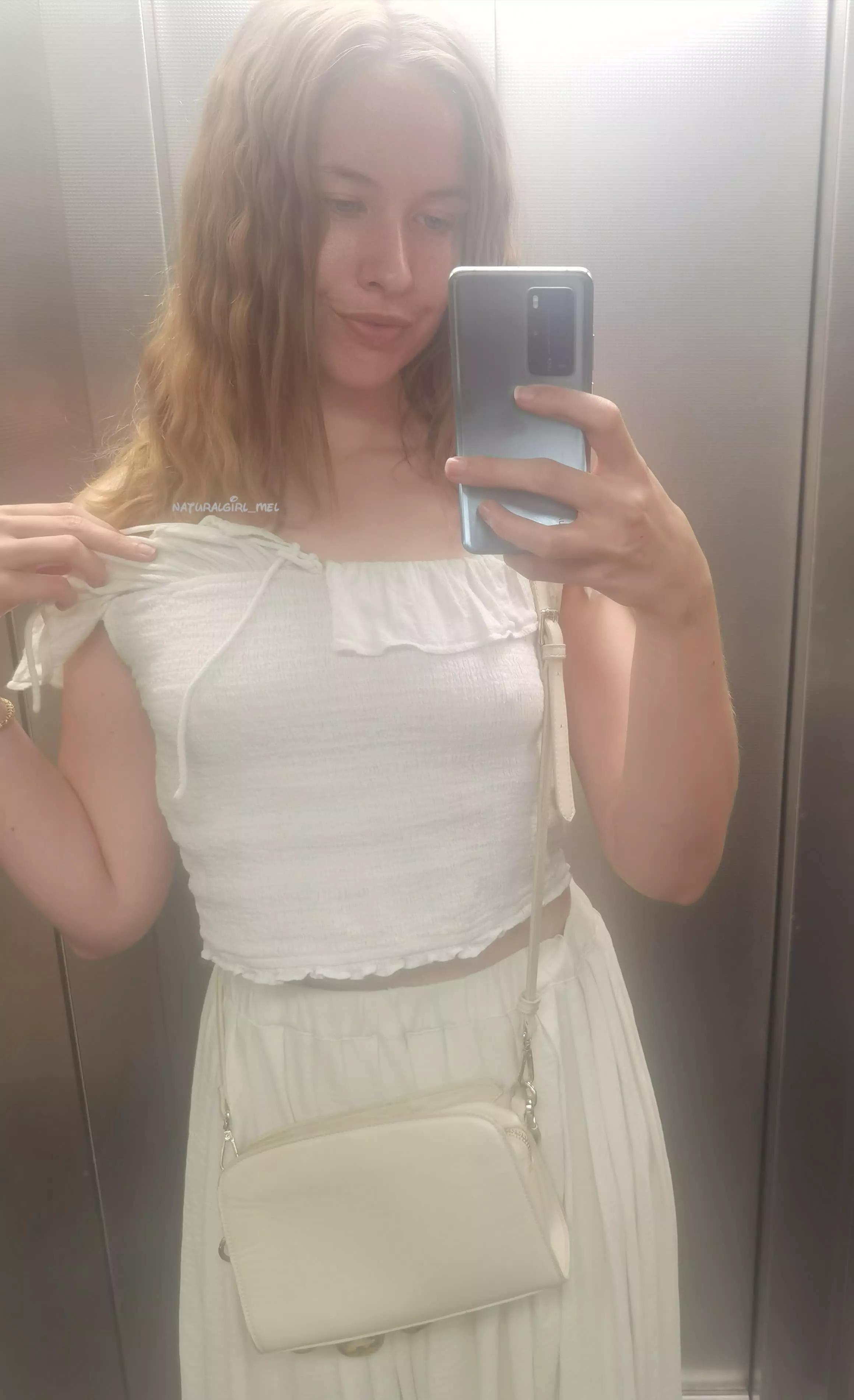 In the elevator and ready to shock my neighbors posted by naturalgirl_mel