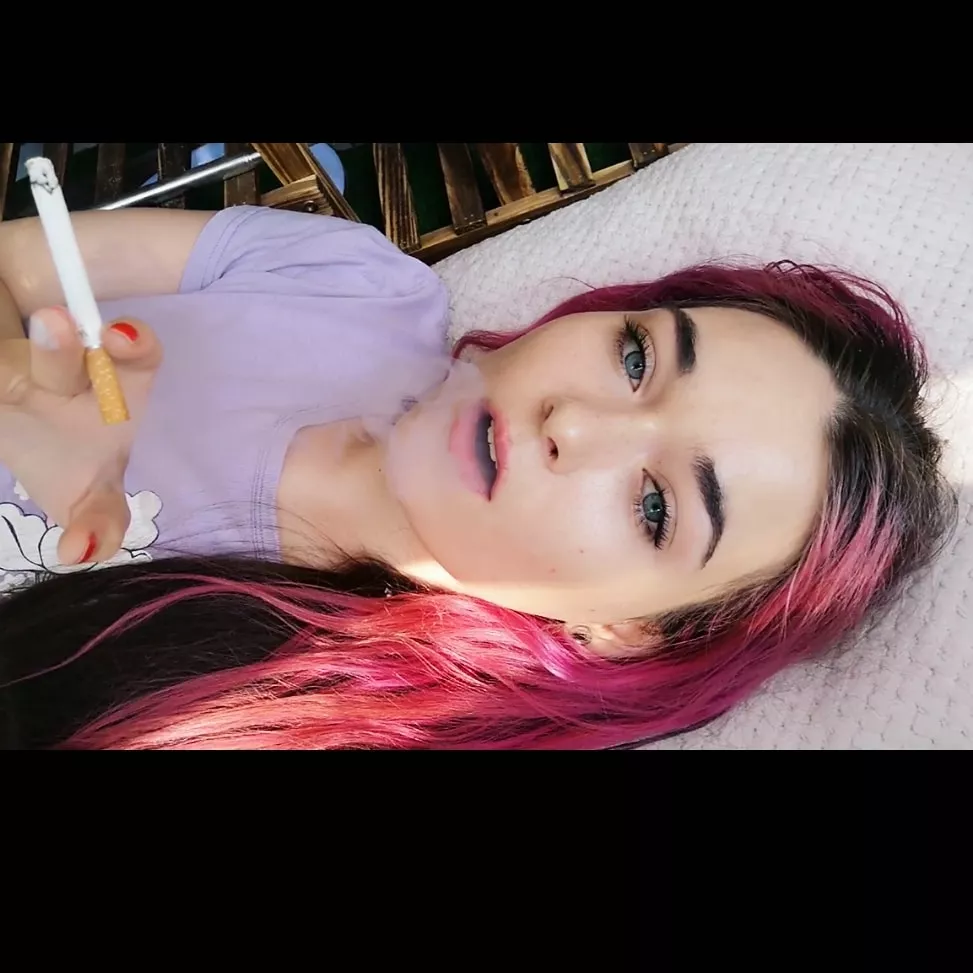 Laying down enjoying my first smoke of the day🌞 posted by smoking_carolyn_