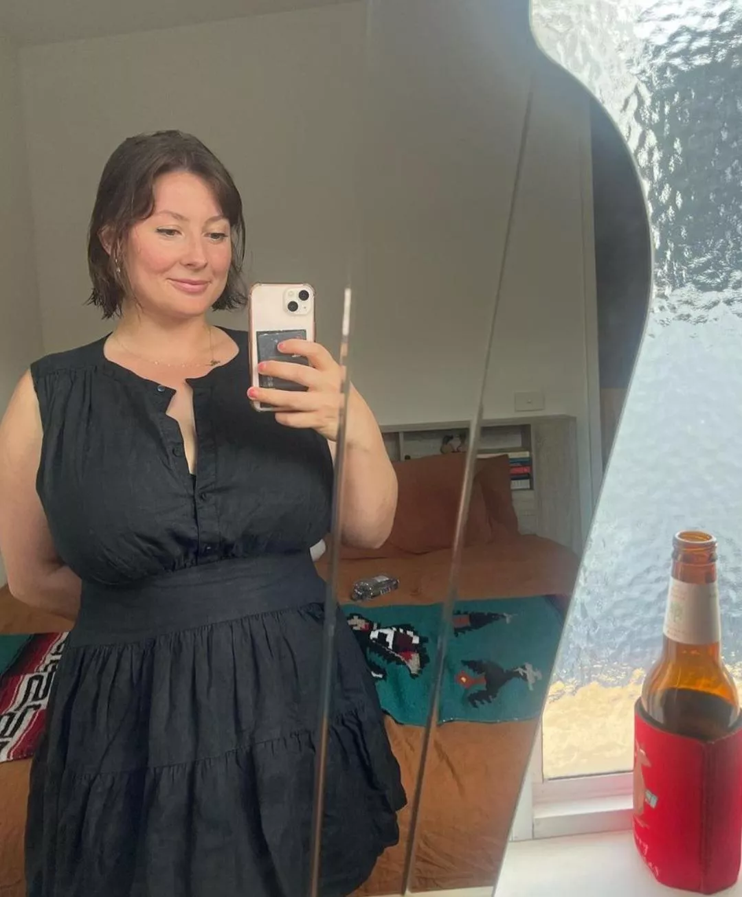 In a beautiful summer black dress posted by dukemayhem