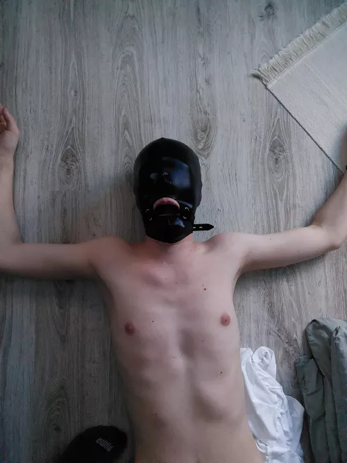 Had to lay on the floor. Hooded, gagged and with cum on my mask. I think submissive describes me very well. Do you agree? by Beatelol-2