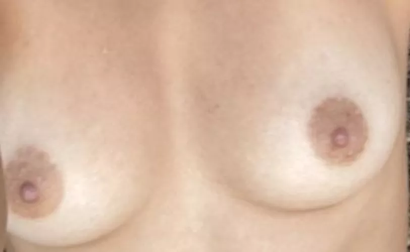 Close up of my areolas so you can see what you’ll be sucking c; by YummyHoneyyy