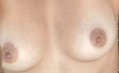 Close up of my areolas so you can see what you’ll be sucking c; posted by YummyHoneyyy