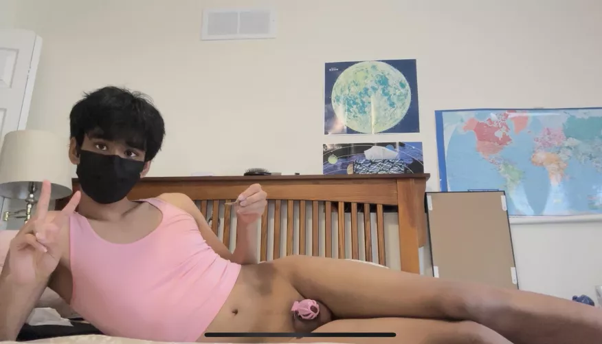 Locked boy lying in bed by CuteFemboySpankee