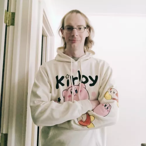 Got a new hoodie! Anyone else a fan of Kirby. I mostly play Sims and games on the Switch. by PrimaryAnxious9259