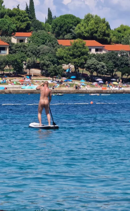 Paddling and tanning at the same time 😎 by misko88