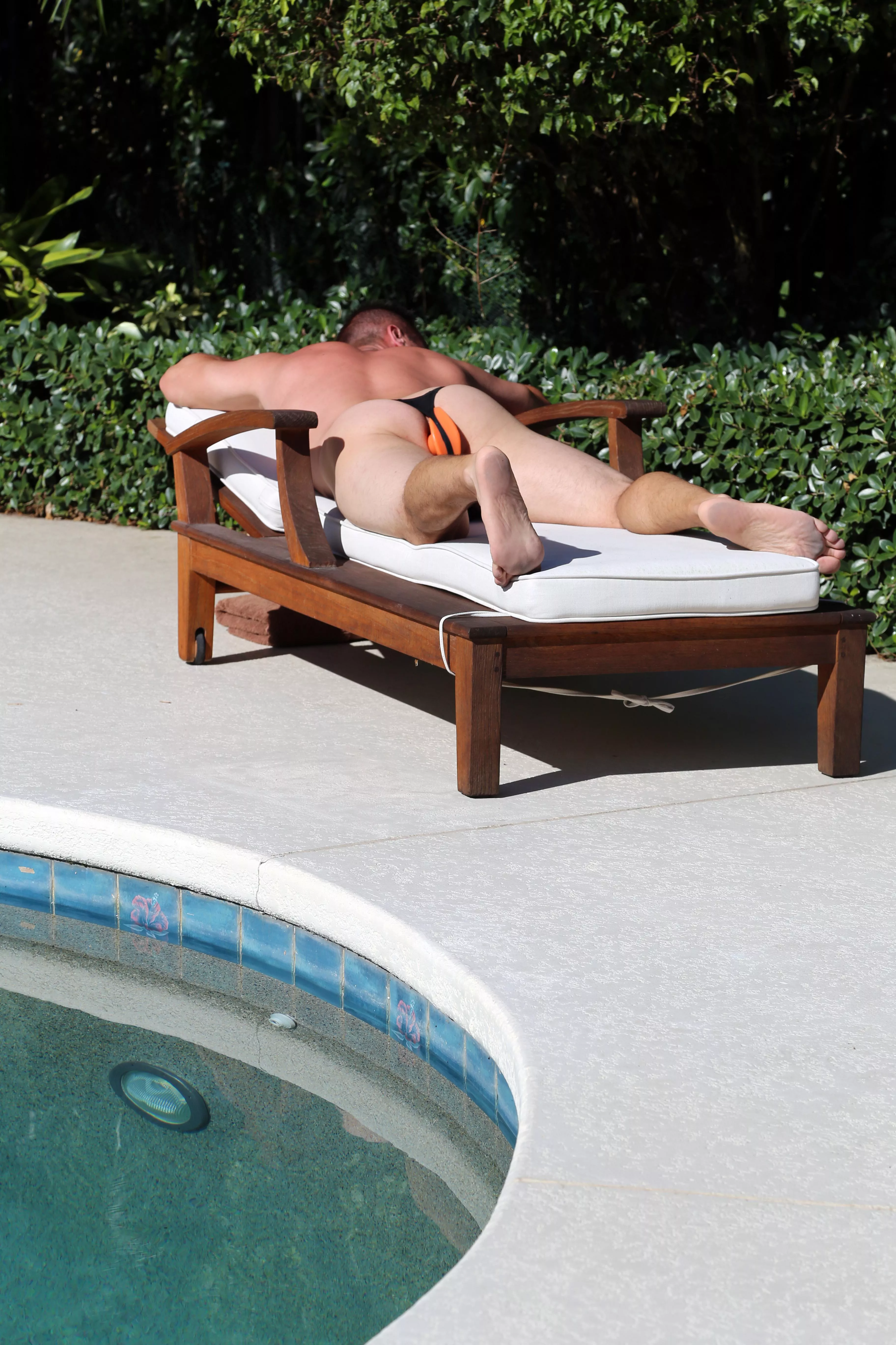 Plugged at the pool today! posted by paradisepegging