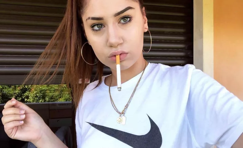 Baby-faced smoker by darkpoetries