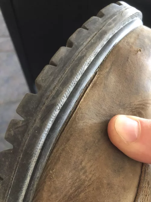 Is this a nothing mark or is it a seam coming undone? Had em a month. by alienatedframe2