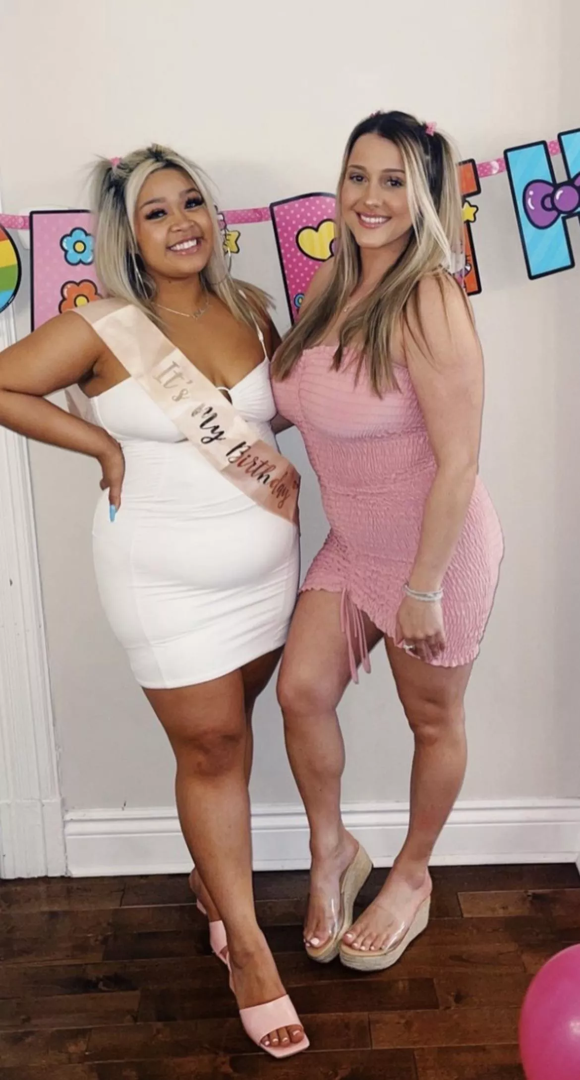 Is the girl on the right intentionally sticking her chest out ? posted by FreezeBrick24