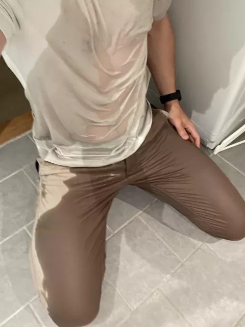 Pissed all over myself, and laid down in my puddle. Felt great. by wetfullyclothed