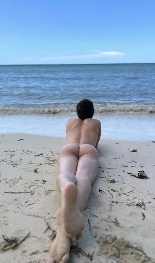 Sun bathing at the beach by Oldmenyoung