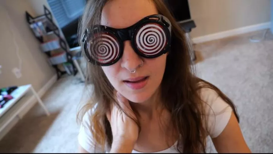 Kara is mind control by the glasses by spiralmaster48