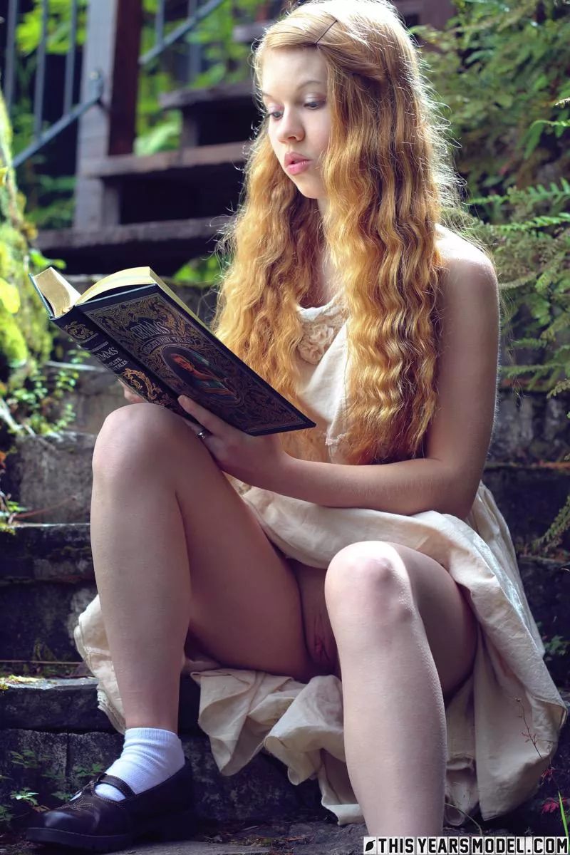 Reading fairy tales posted by pinup_beauty