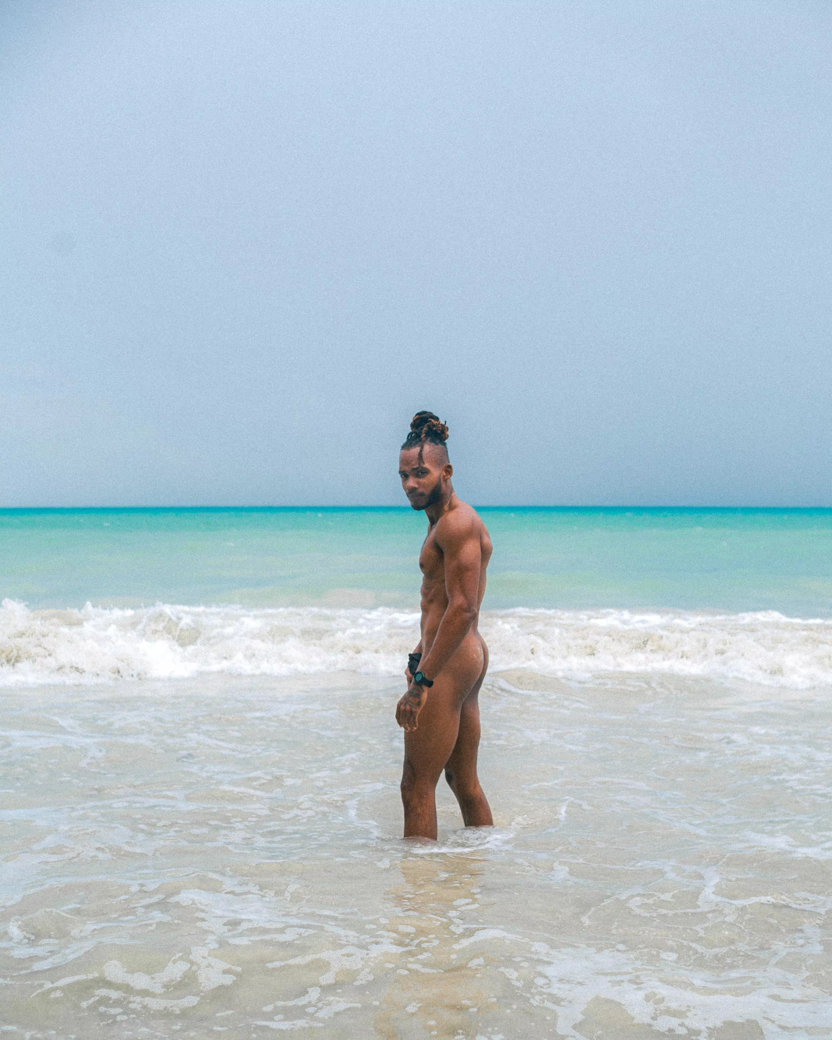 Unclothed at the beach posted by carribean_fitathlete