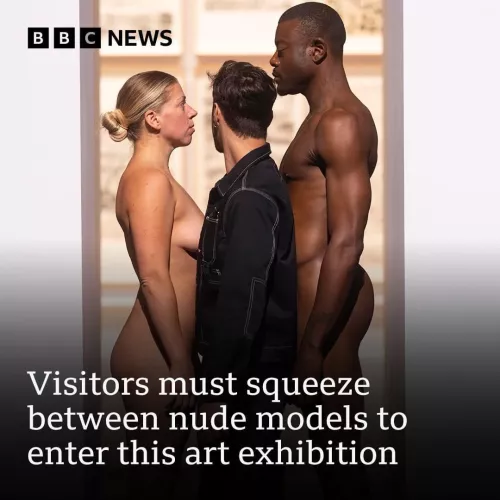 Squeezing through two nude models to enter this art exhibition by mytwocents10