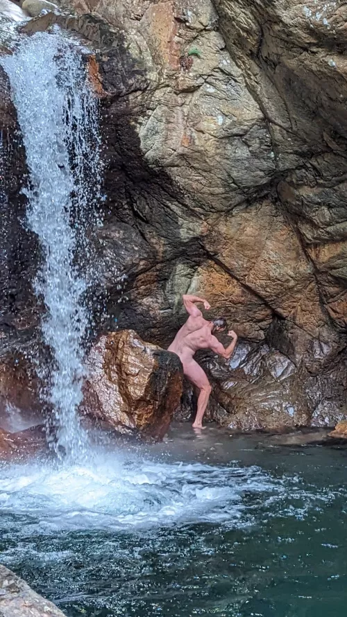 Needed a quick shower after the hike. Nothing better then a waterfall for it by microman715