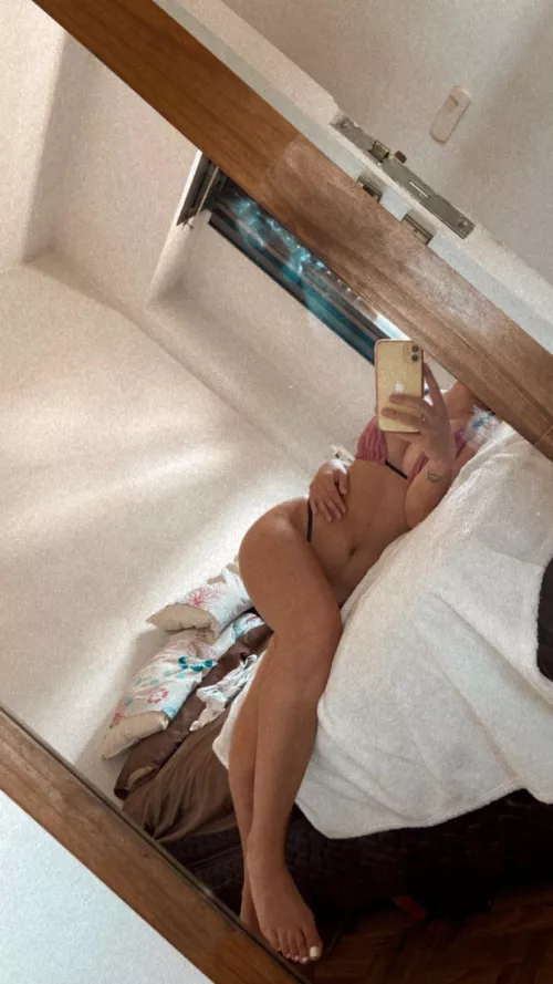 Sideways on the bed showing the feet that you like so much by hamfromwyoming