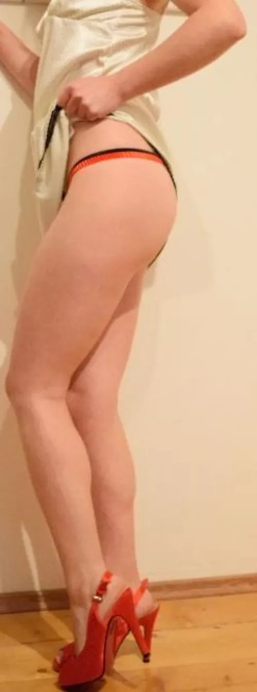 legs with red heels by Plastic_Marsupial297