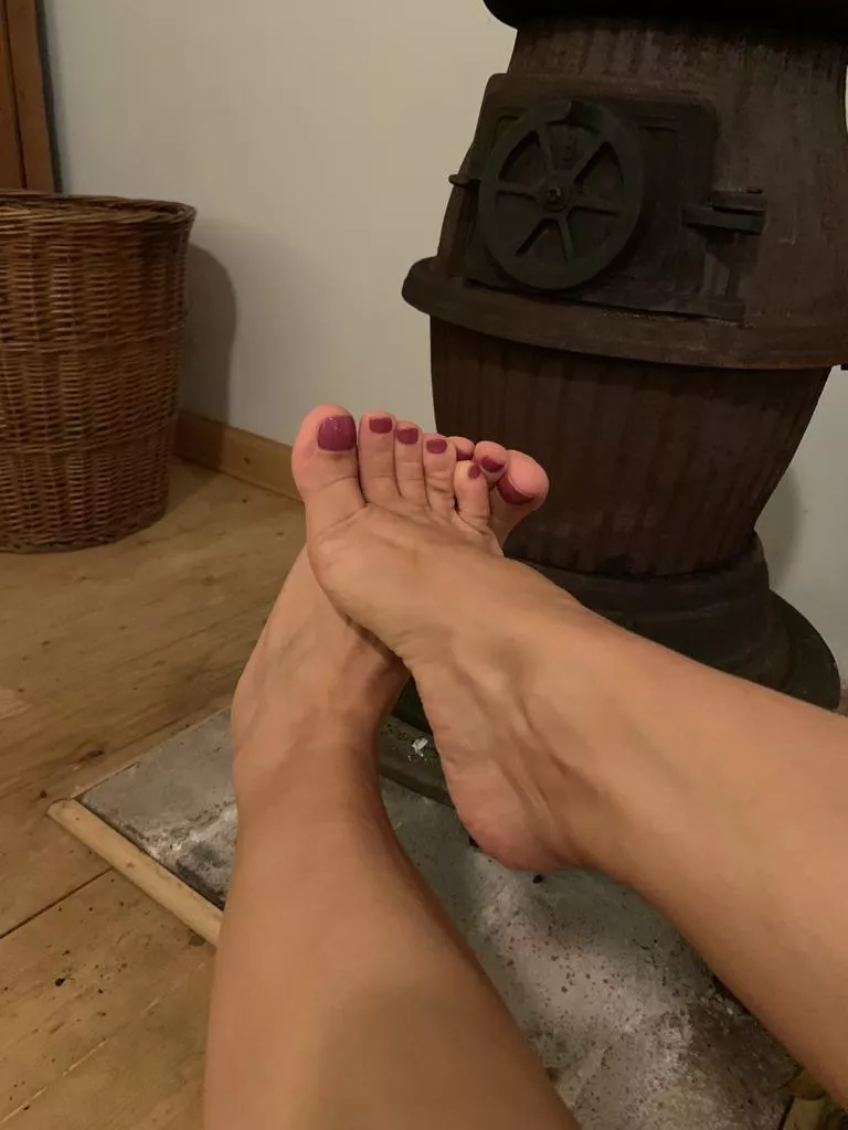 warming my feet after a long wet hike posted by MalinaWhispers