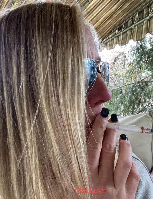 Sneaking a smoke outside.... by melluvsitall